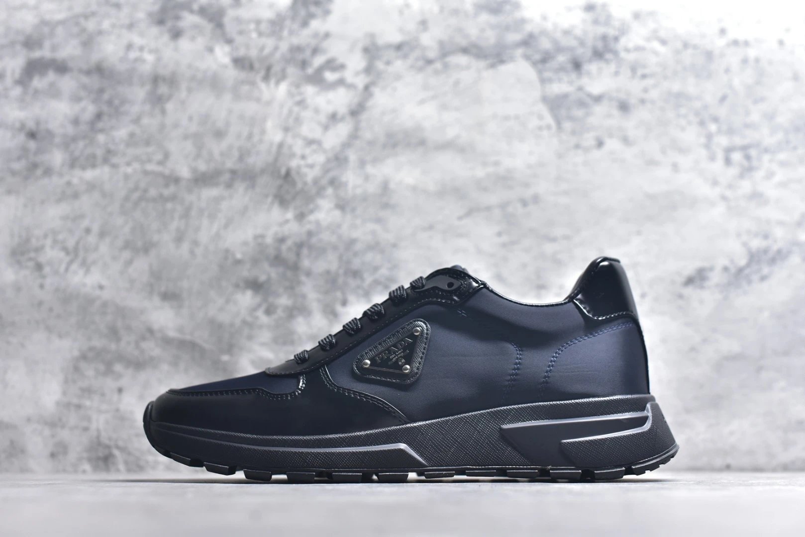 Prada Sneakers Prax 01 — Prax 01 black and blue patent leather with silver logo