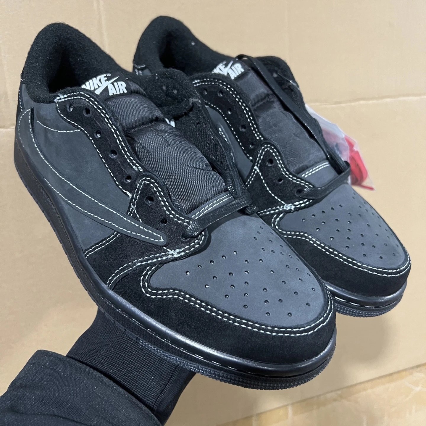 AJ1 Low-Top Black Reverse Swoosh DM7866-001 SKU image