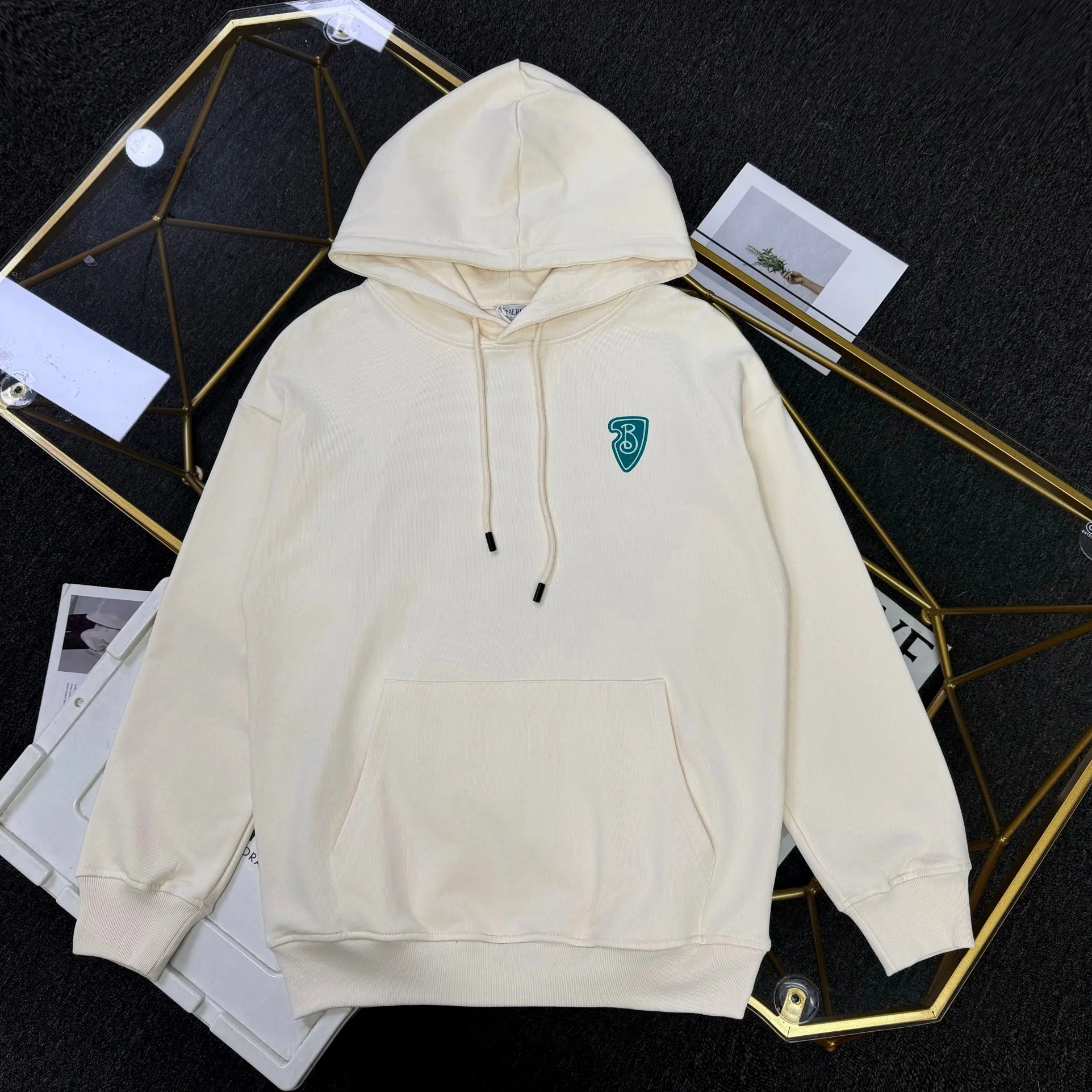 Cream Hooded Sweatshirt With Teal Shield Logo Casual Pullover