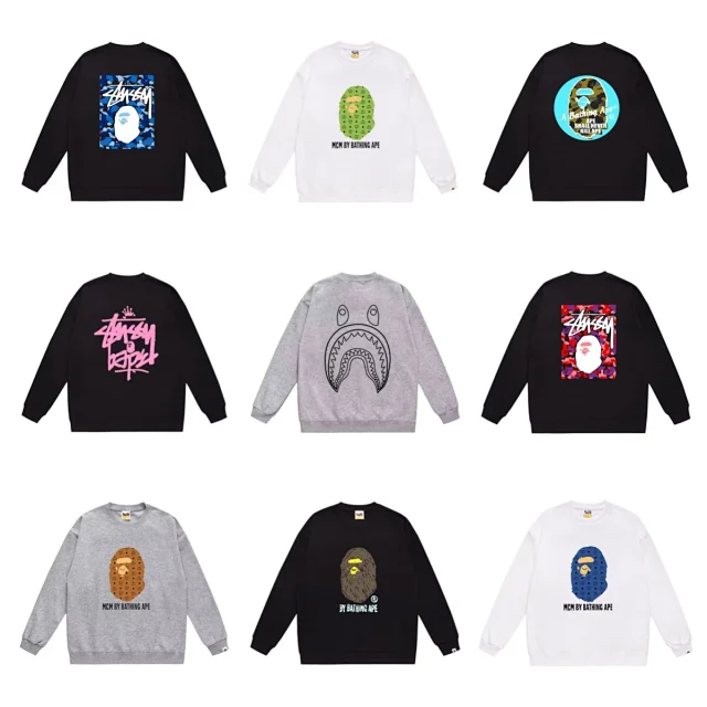 A Bathing Ape; Stüssy Graphic crewneck sweatshirts with ape-head and camouflage prints product detail image 3