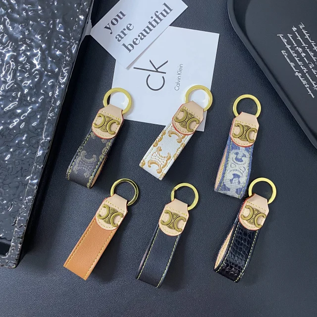 Louis Vuitton Uncategorized Leather strap keychain with gold-tone LV monogram product detail image 2