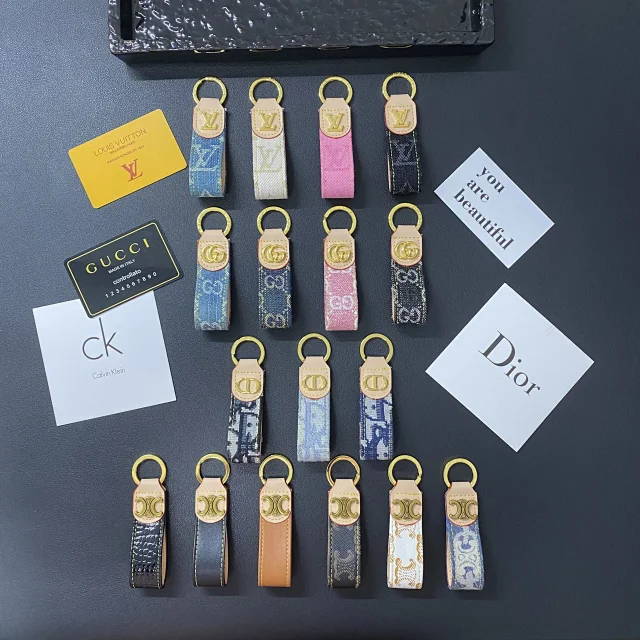Louis Vuitton Uncategorized Leather strap keychain with gold-tone LV monogram product detail image 1