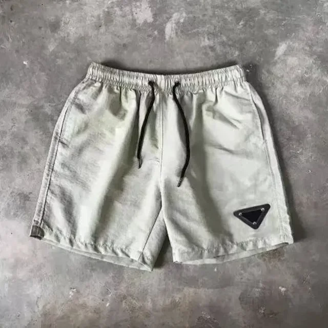 Prada Swimwear Drawstring Swim Shorts with Triangle Logo Patch product detail image 12