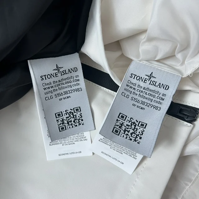 Stone Island Jackets Hooded zip-up shell jacket with compass sleeve patches product detail image 31
