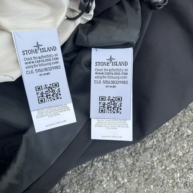 Stone Island Jackets Hooded zip-up shell jacket with compass sleeve patches product detail image 36
