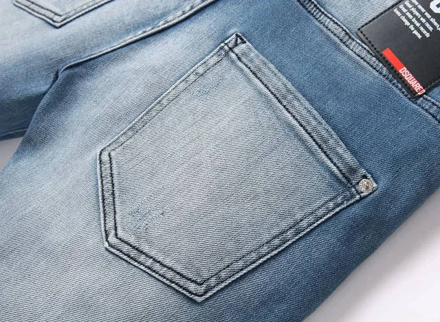 DSQUARED2 Shorts Distressed graphic-print denim product detail image 7