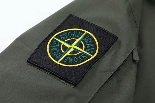 Stone Island Jackets Hooded zip-up shell jacket with compass sleeve patches product detail image 17