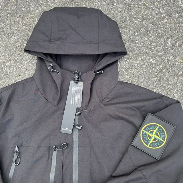 Stone Island Jackets Hooded zip-up shell jacket with compass sleeve patches product detail image 24