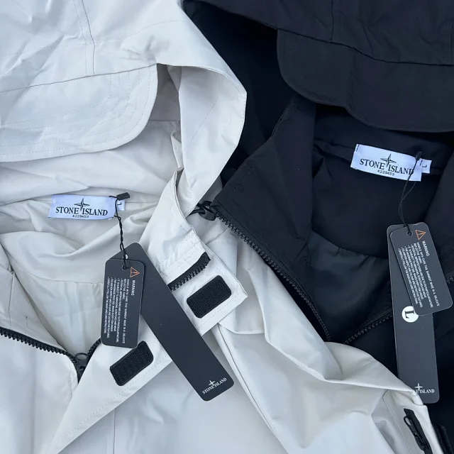 Stone Island Jackets Hooded zip-up shell jacket with compass sleeve patches product detail image 35