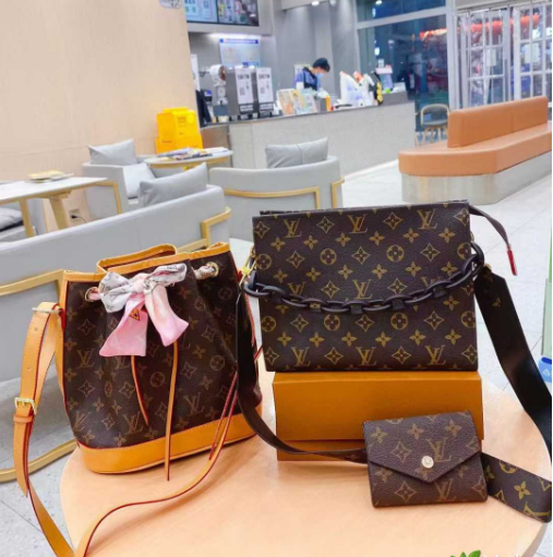 Louis Vuitton Monogram Canvas Bucket Bag with Pink Bow, Chain Crossbody Bag, and Pochette Métis Wallet