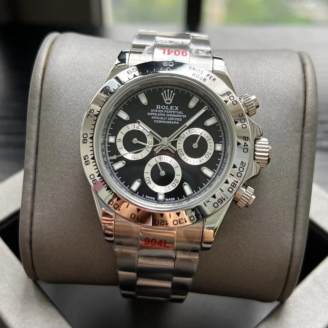 Silver case, baton index black dial, steel band, silver bezel