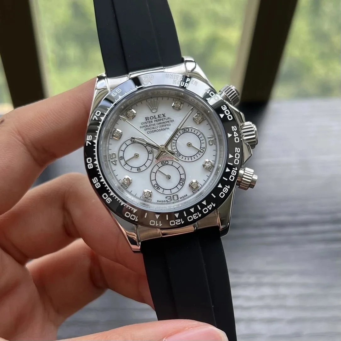 Silver case, inner diamond mother-of-pearl dial, black rubber strap