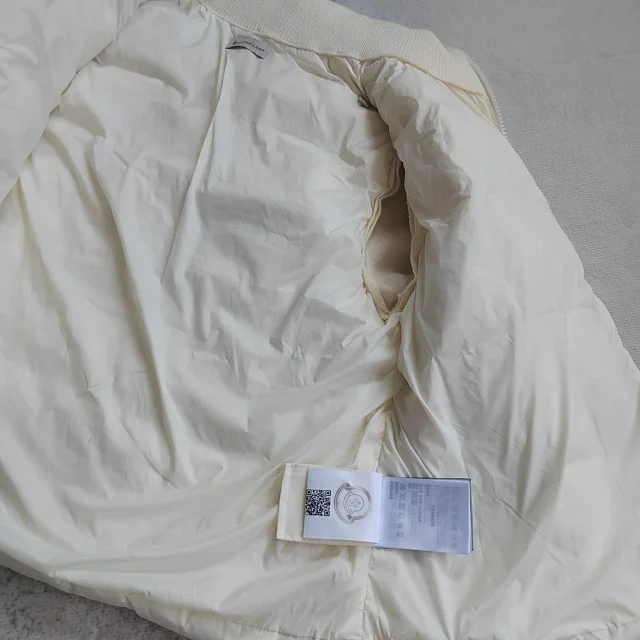 Moncler Down Jackets Quilted knit-sleeve jacket with flap pockets product detail image 9