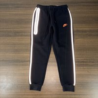 Black reflective pants with orange stripes