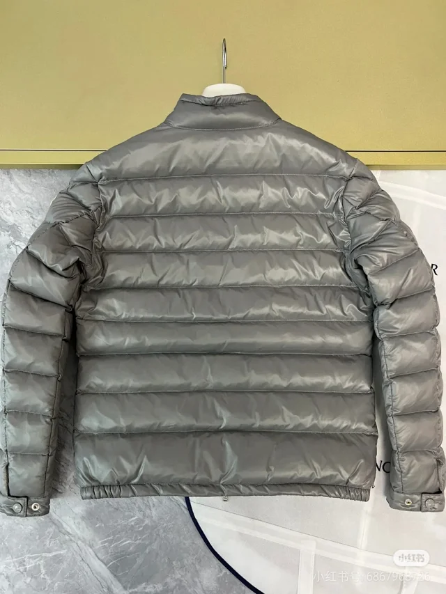 Moncler Down Jackets Quilted stand-collar puffer jacket with zip pockets product detail image 11