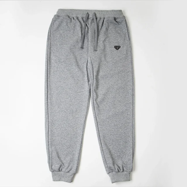 Prada Trousers Drawstring cuffed jogger sweatpants with triangular logo patch product detail image 5