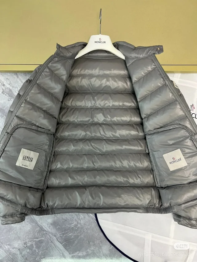 Moncler Down Jackets Quilted stand-collar puffer jacket with zip pockets product detail image 9