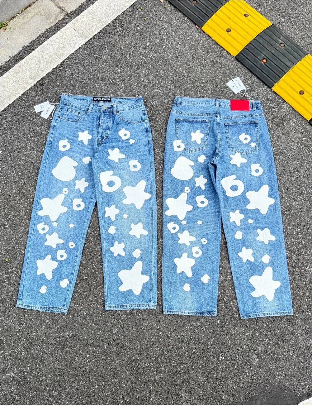 DX15发泡印花大星星洗水休闲牛仔裤