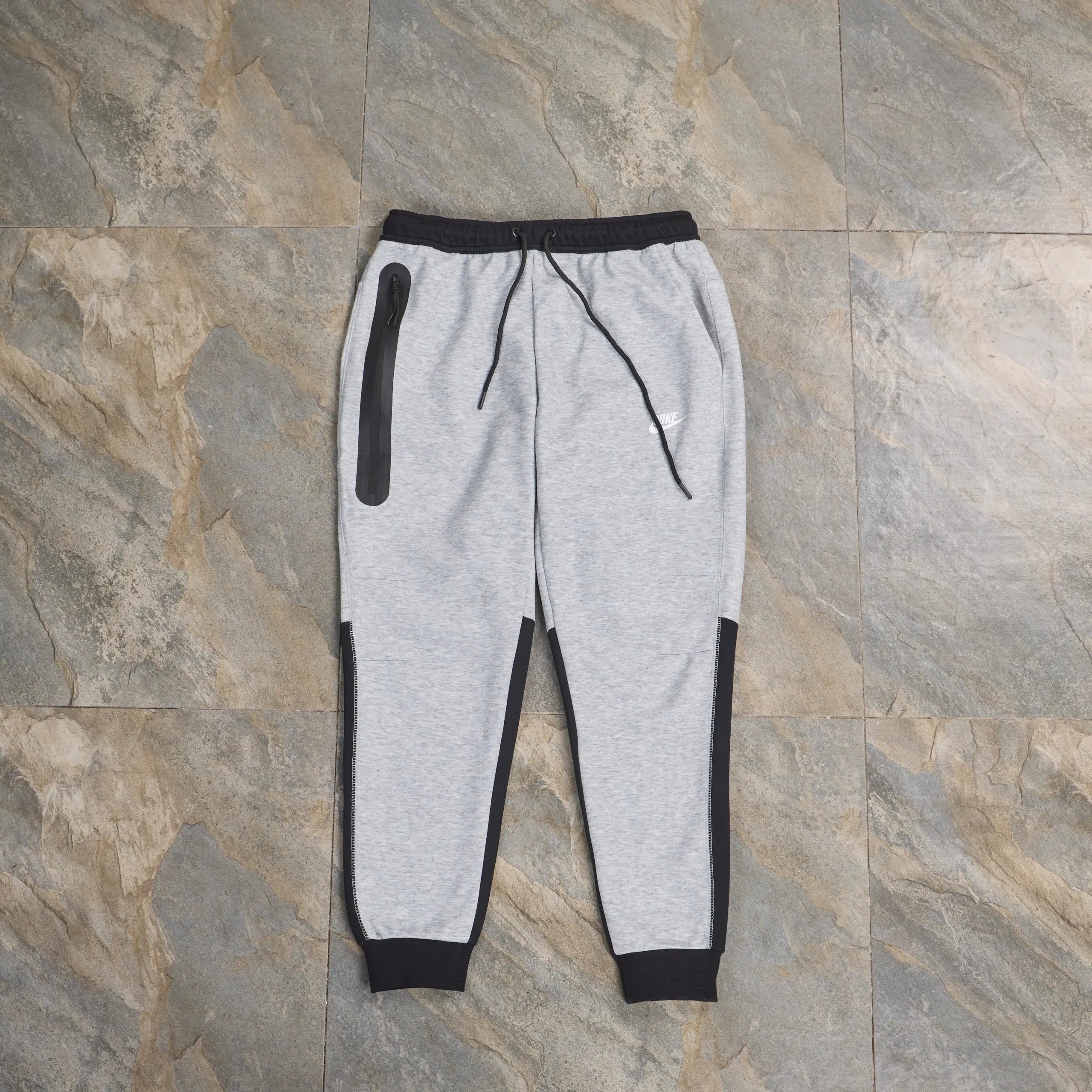 Black and light gray pants