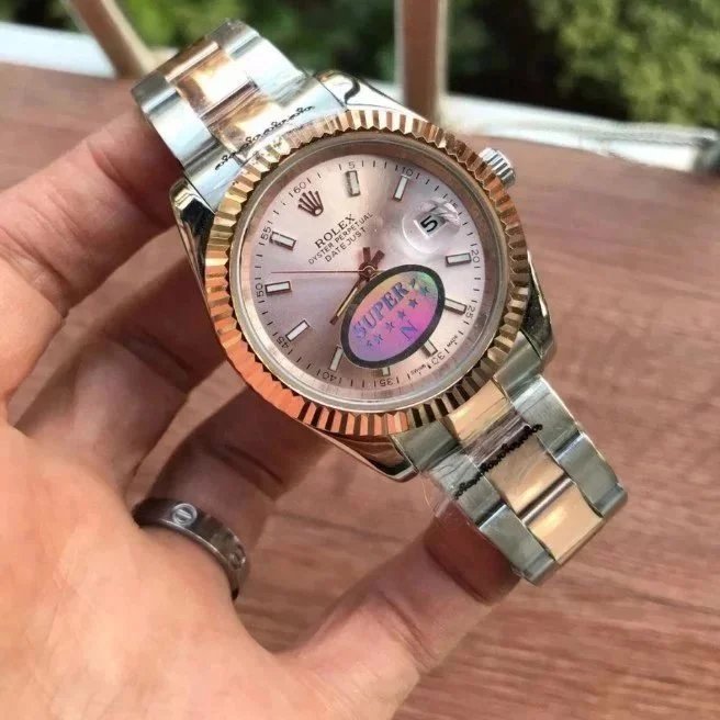 Two-Tone Rose Gold Pink Dial · 3-Link Bracelet
