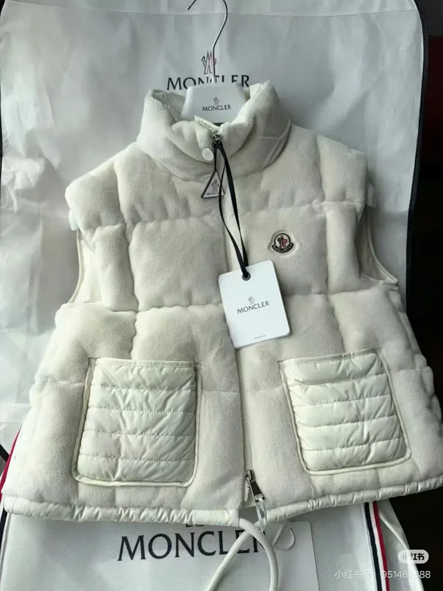 Moncler Vests Quilted zip-up high-neck vest with patch pockets and drawstring hem product detail image 3