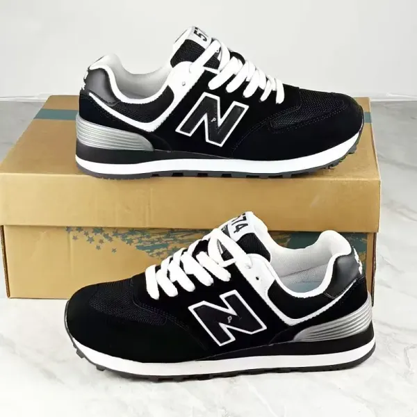 New Balance 574 Black and White Sneakers - 1