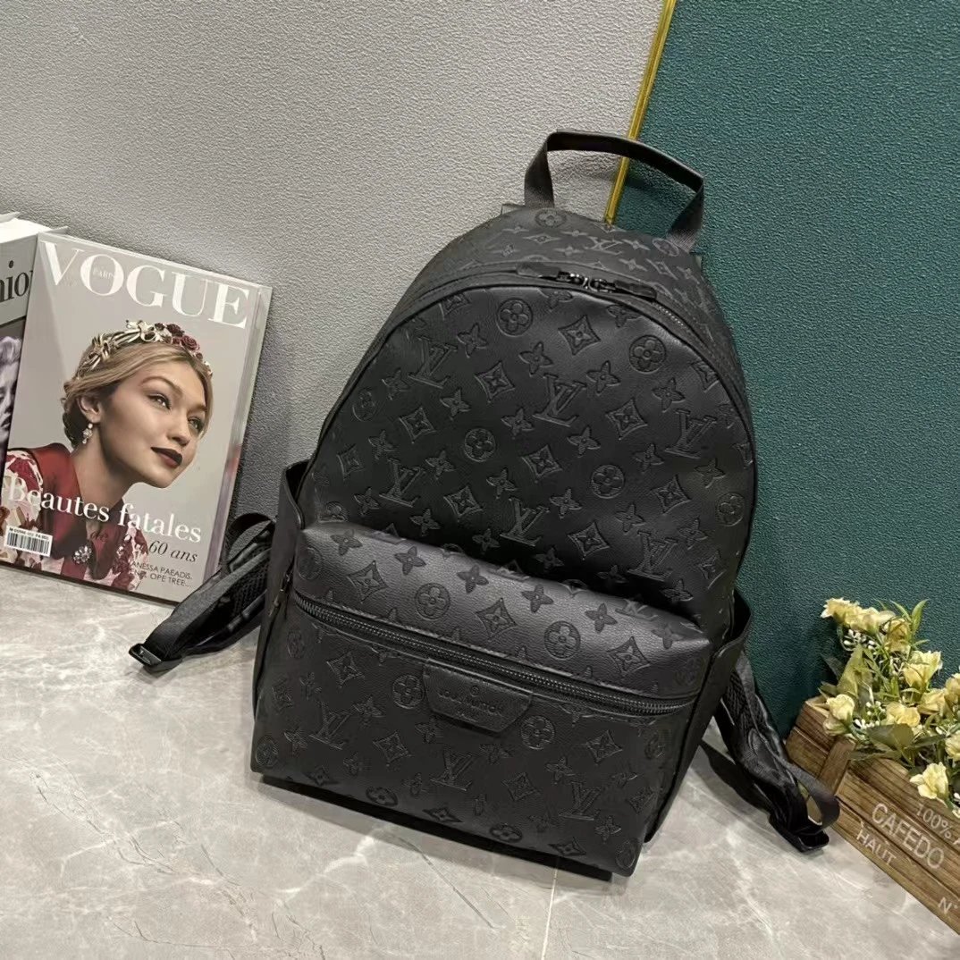 Louis Vuitton Discovery Backpack MM Monogram Empreinte Embossed Grey Leather