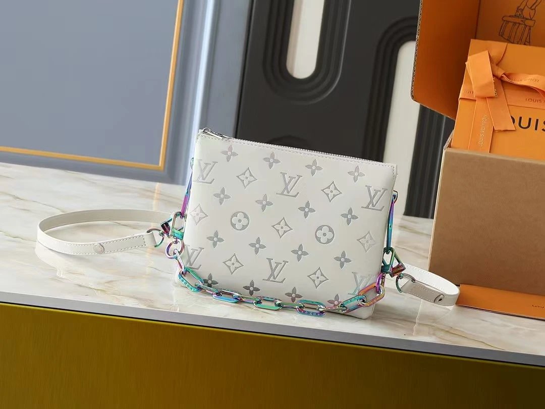 Louis Vuitton Coussin PM Crossbody Bag White Monogram Embossed Leather with Iridescent Rainbow Chain