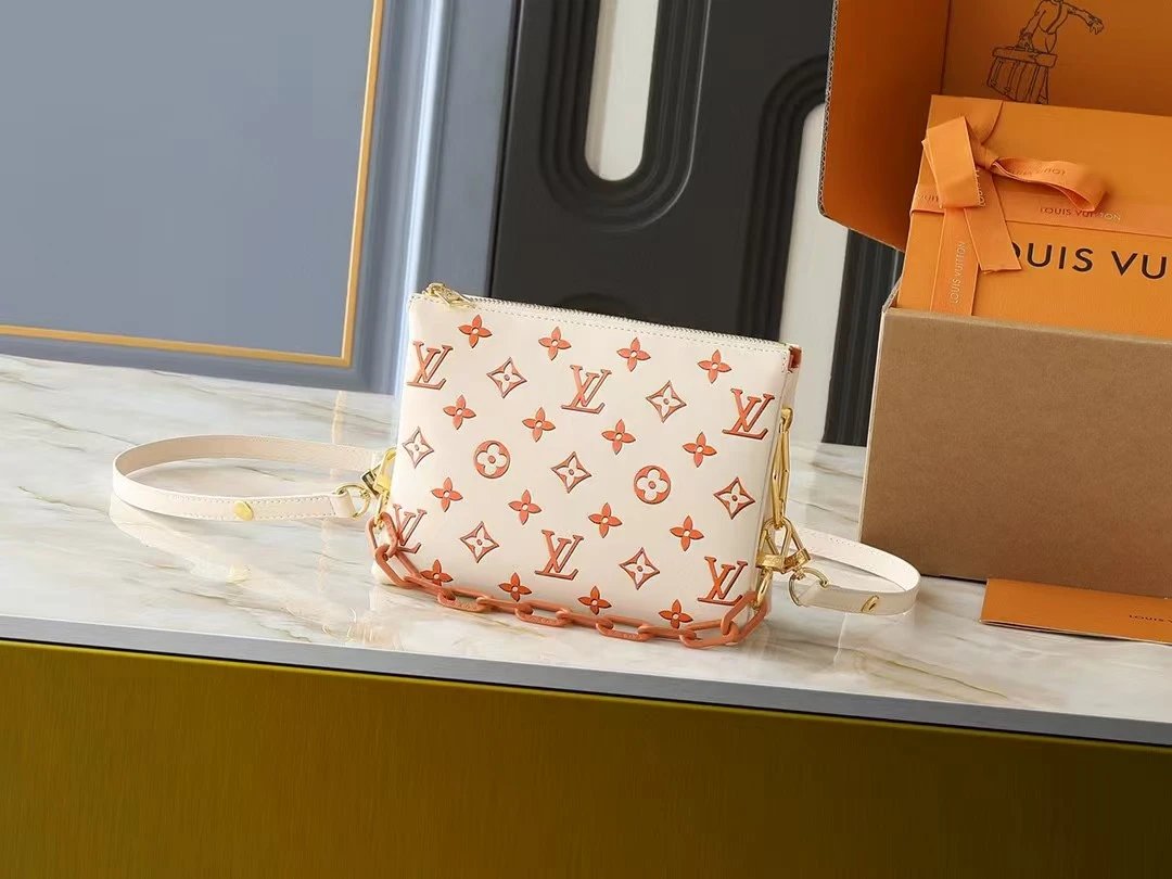 Louis Vuitton Coussin PM Crossbody Bag Cream White Monogram Embossed Leather with Coral Orange Accents