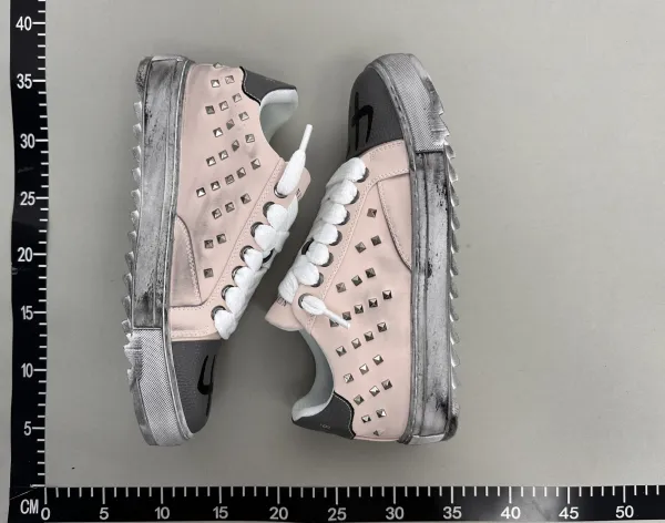 Valentino Garavani Rockstud Spike Low Top Pink Sneakers - 1