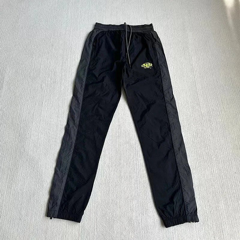 Corteiz Trousers Elastic-waist track pants with CPTZ crest and mesh leg panels — 4