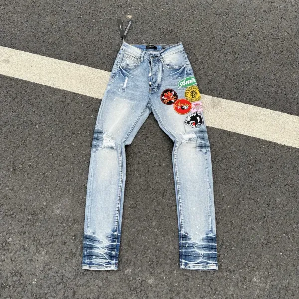 Amiri Patchwork Distressed Slim Fit Light Wash Jeans - 1