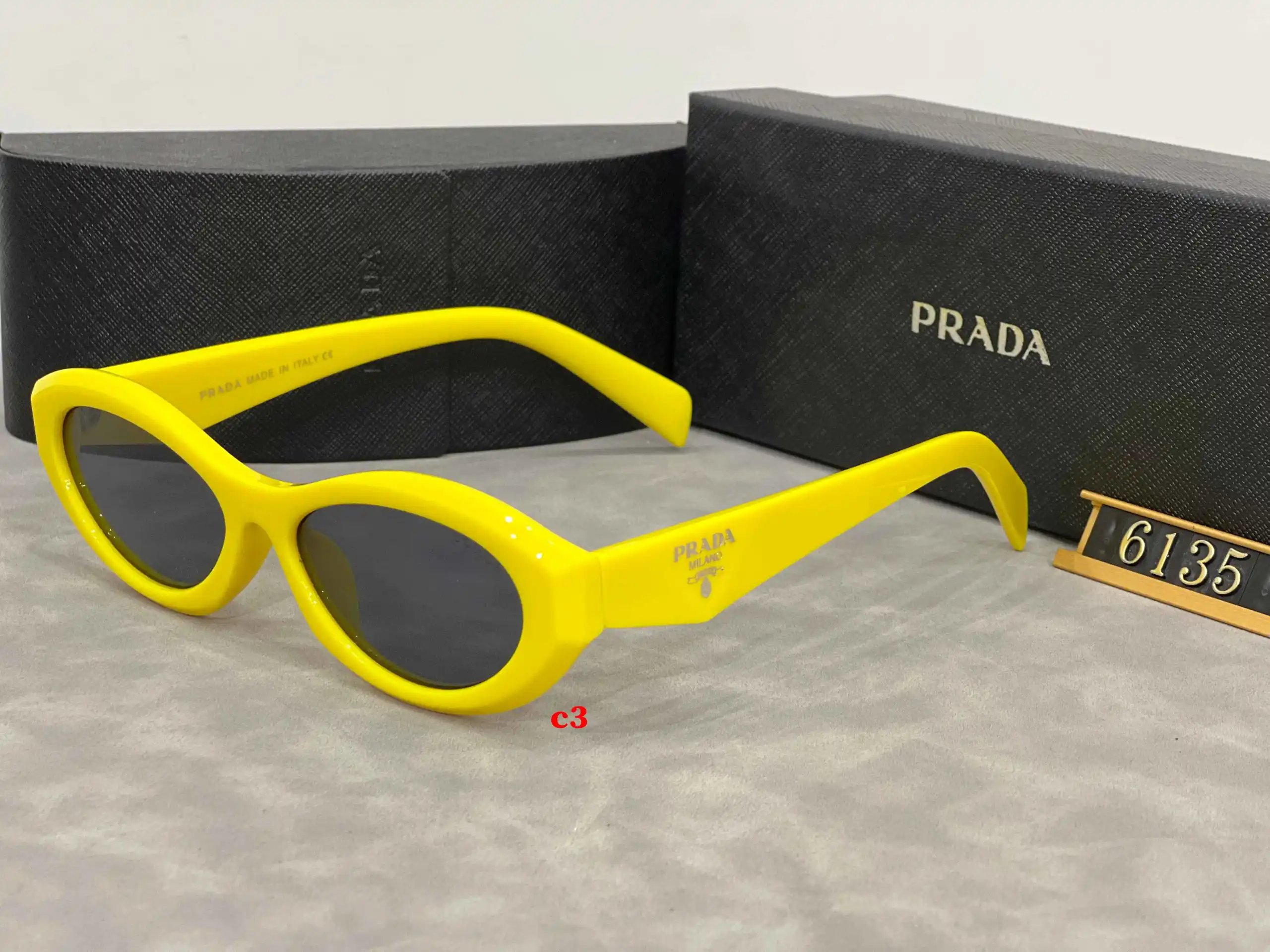 Prada Eyewear 5608 geometric-temple sunglasses — 6135-4