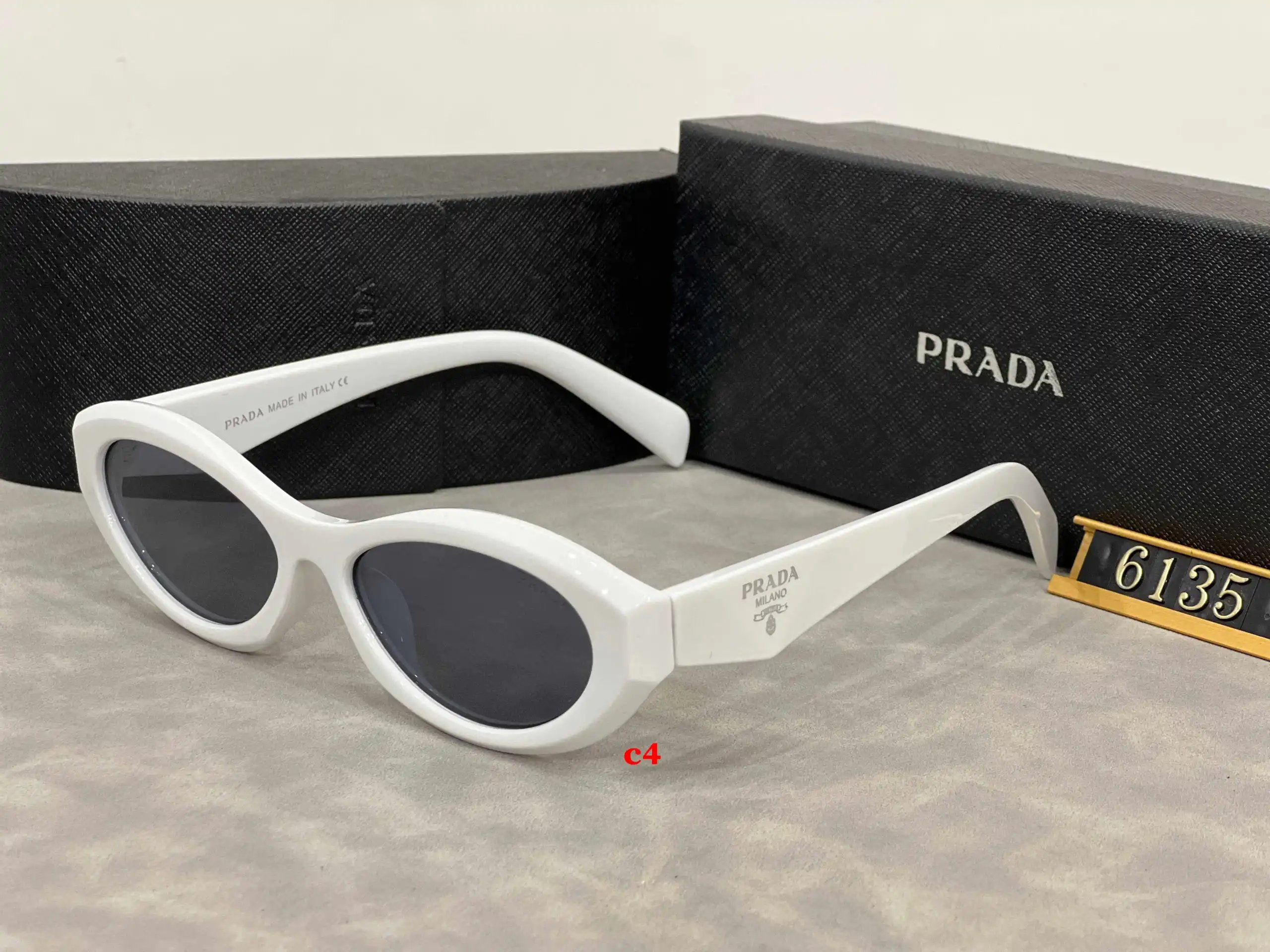 Prada Eyewear 5608 geometric-temple sunglasses — 6135-2