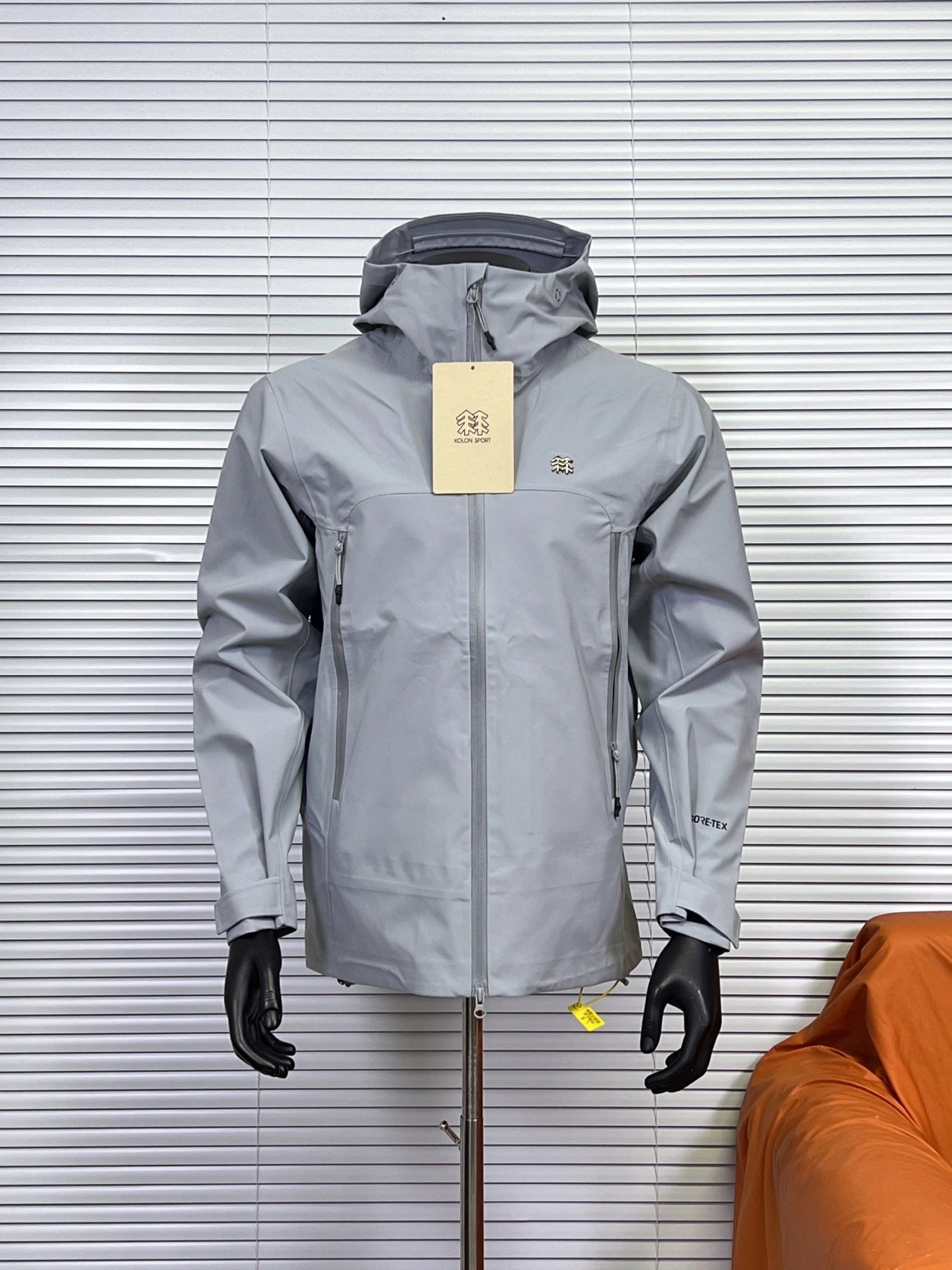 KOLON SPORT Jackets Hooded waterproof shell jacket with zip pockets — Light blue
