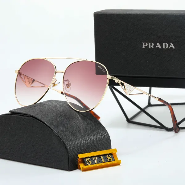 Prada Aviator-Style Sunglasses with Gradient Pink Lenses and Gold Frame - 1