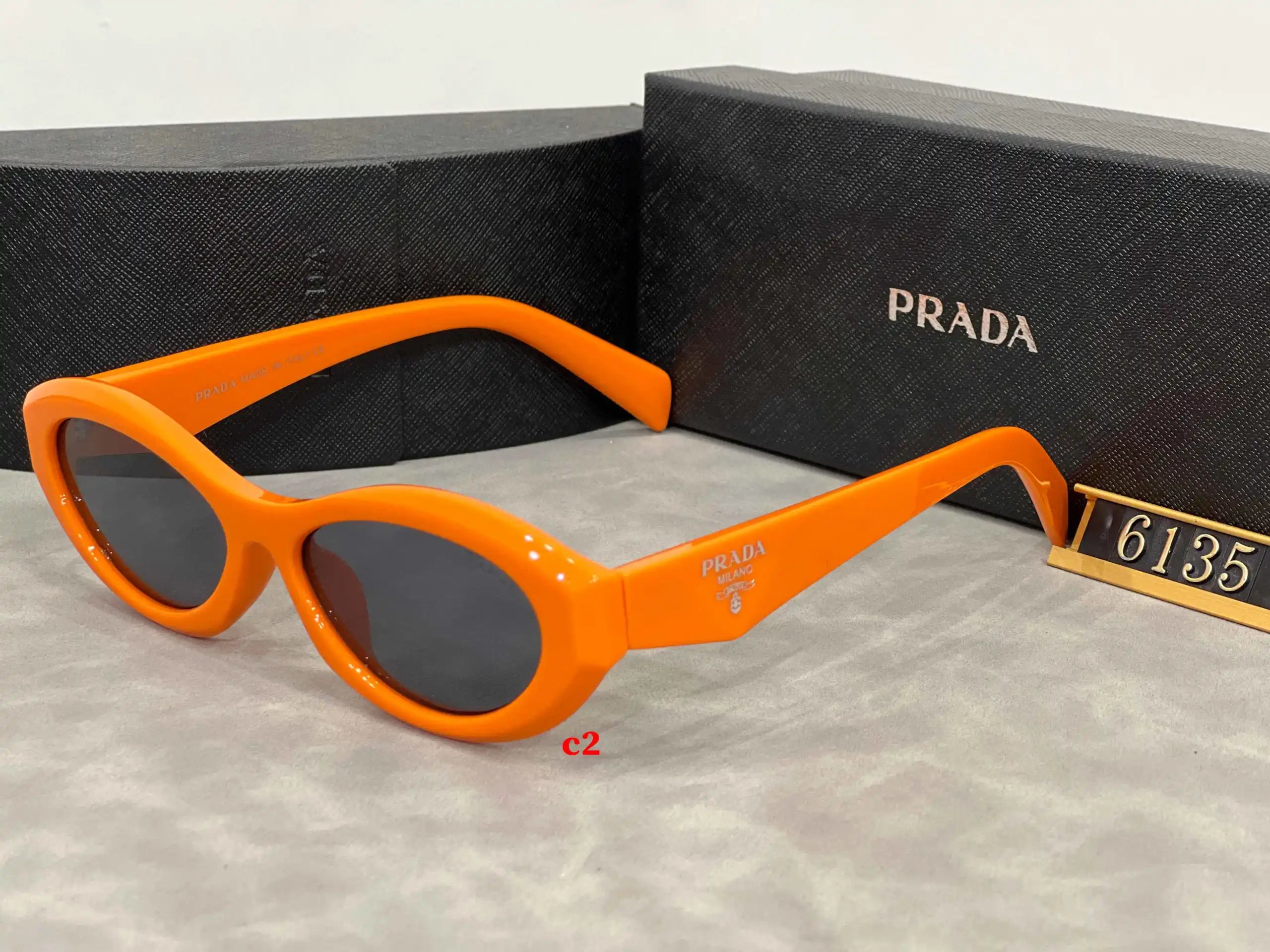 Prada Eyewear 5608 geometric-temple sunglasses — 6135-5