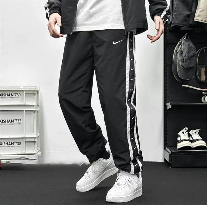Nike Track Pants Black with White Swoosh Stripe Pants