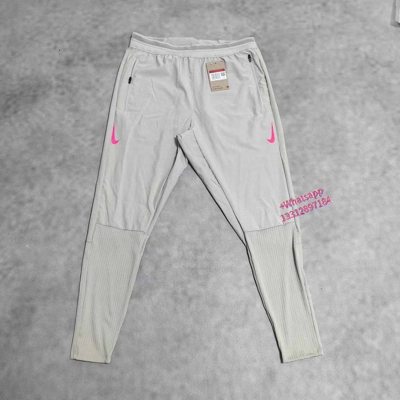 Nike Jackets Trail hooded zip-up windbreaker — White double-pink-hook ribbed sweatpants