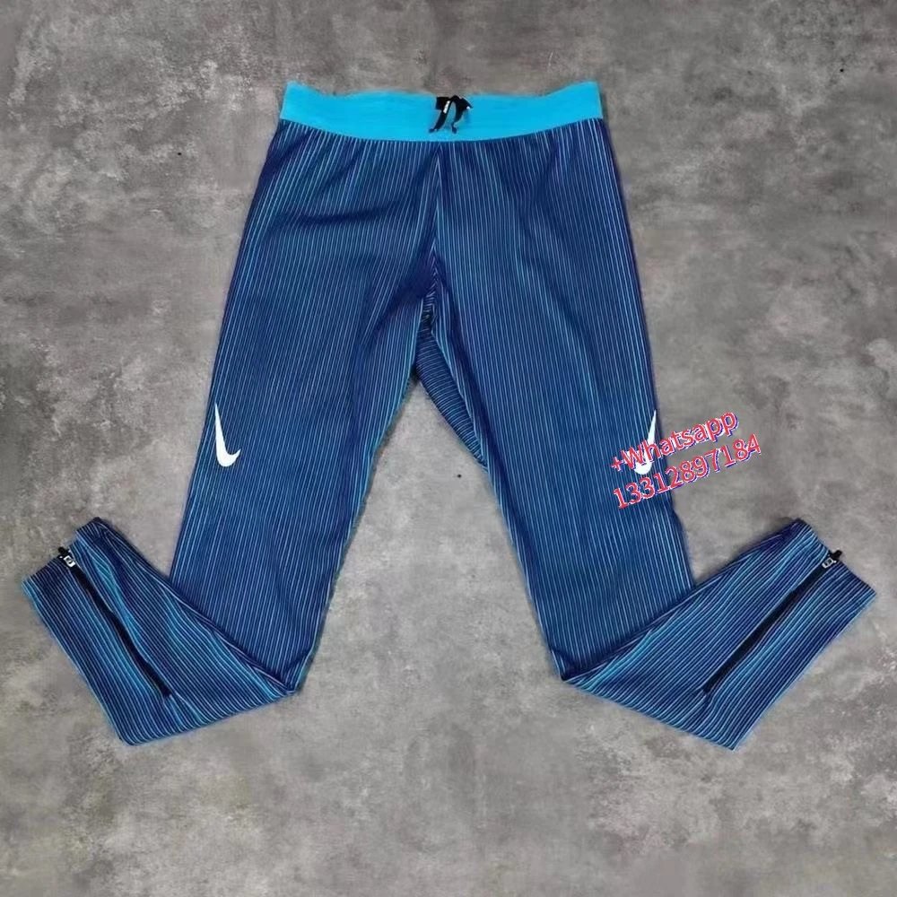Nike Jackets Trail hooded zip-up windbreaker — Blue ribbed leggings