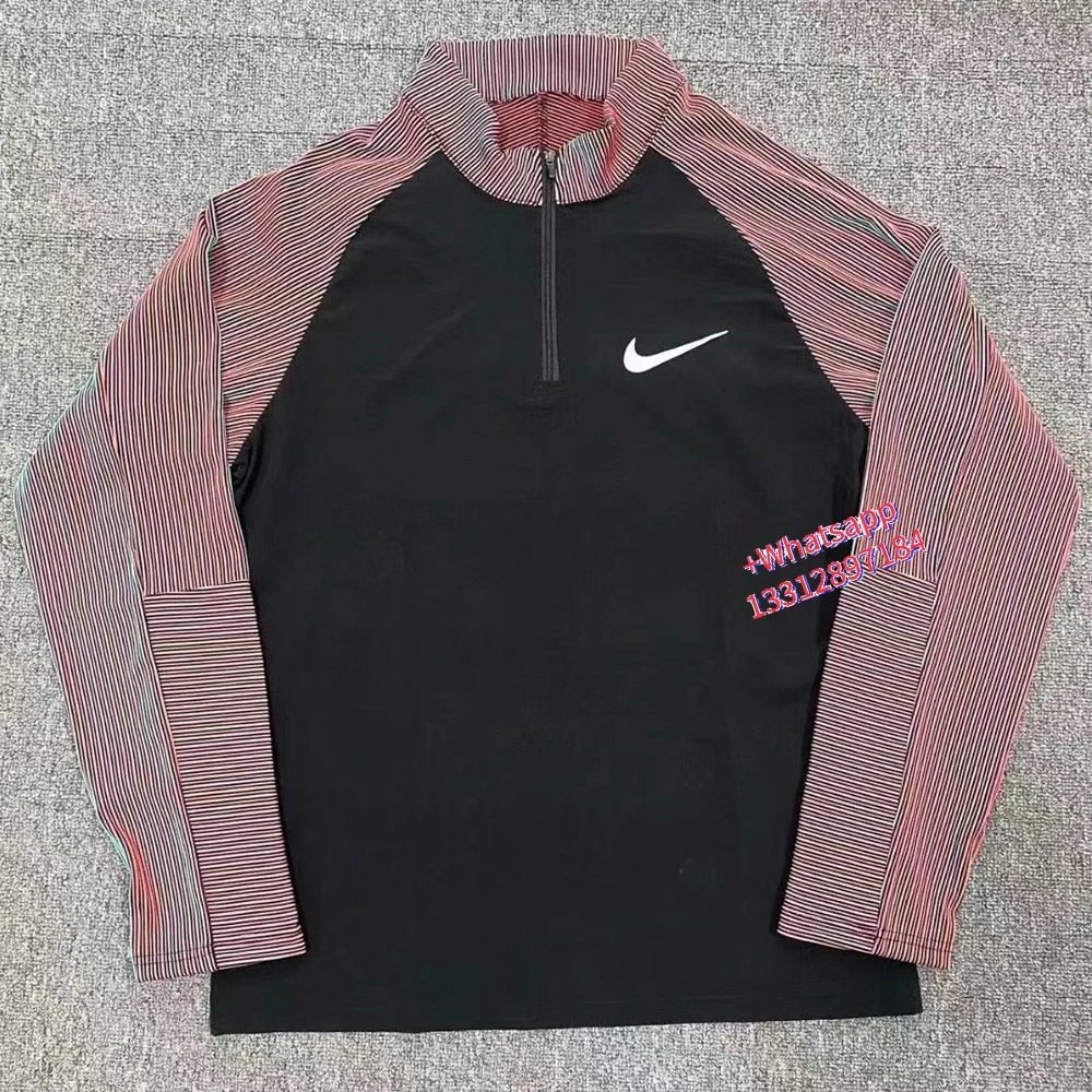 Nike Jackets Trail hooded zip-up windbreaker — Red ribbed half-zip long-sleeve