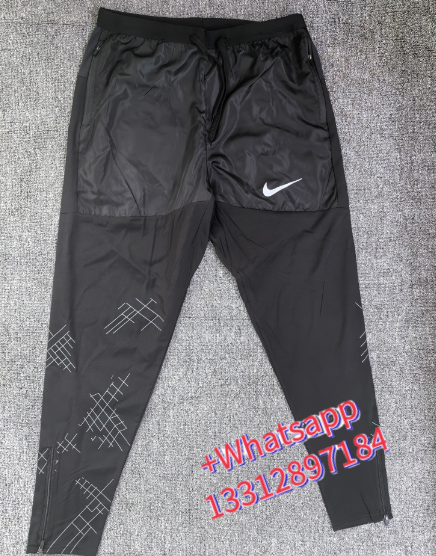 Nike Jackets Trail hooded zip-up windbreaker — Hot Black Trousers 02