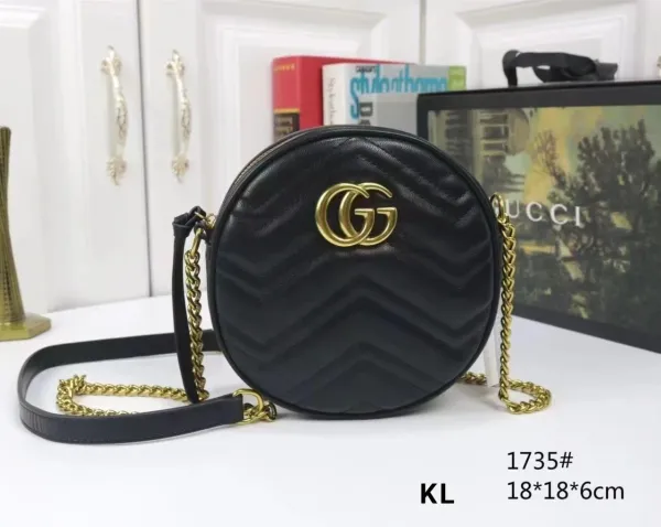 Gucci Marmont Mini Round Bag Black Quilted Leather Crossbody Bag - 1