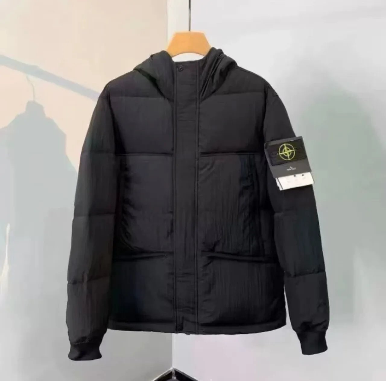 Stone Island Down Jackets Hooded quilted puffer jacket with sleeve compass patch — Black-01