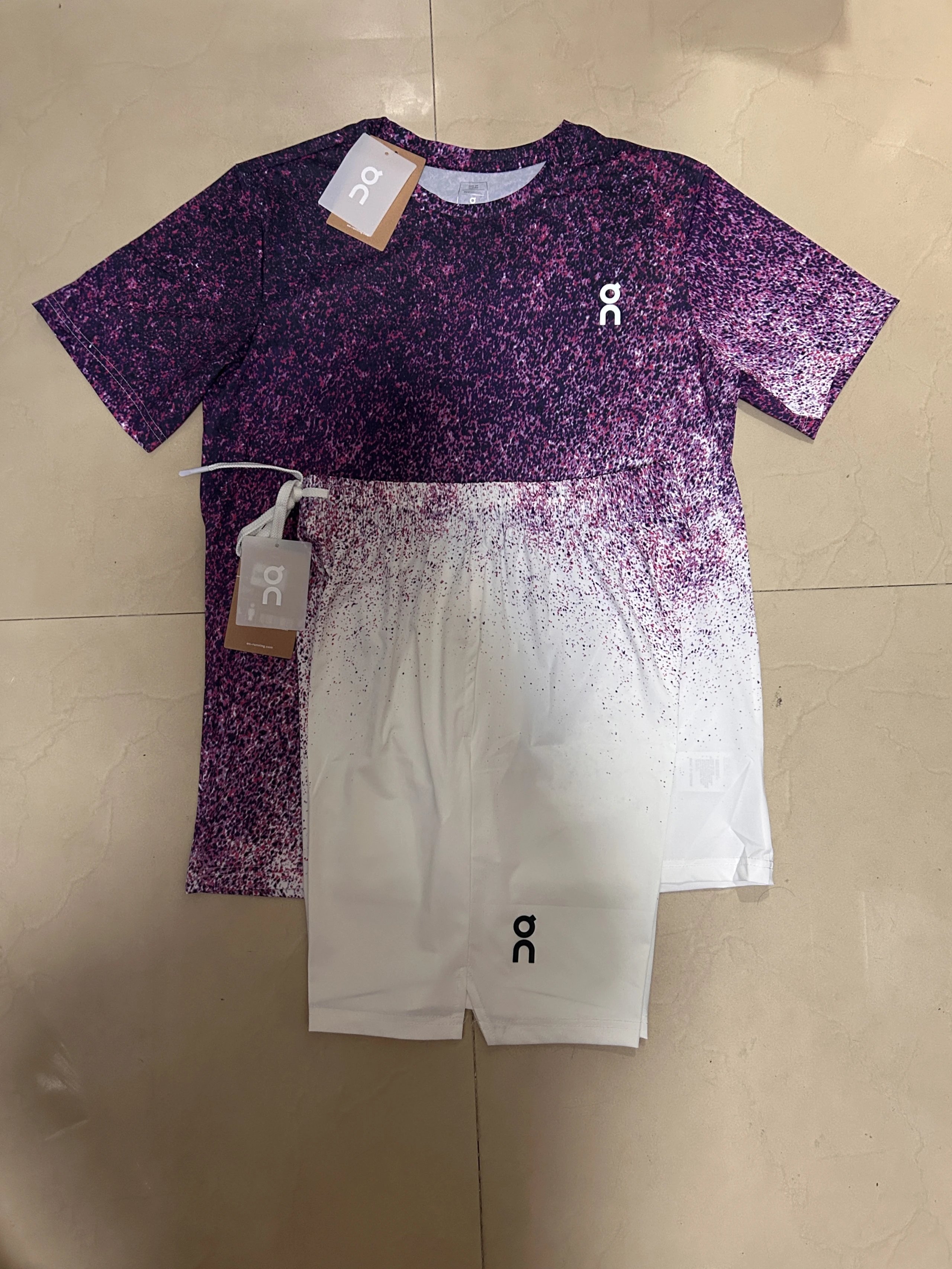On Matching Sets Short-sleeve T-shirt and shorts set with speckled gradient print — purple
