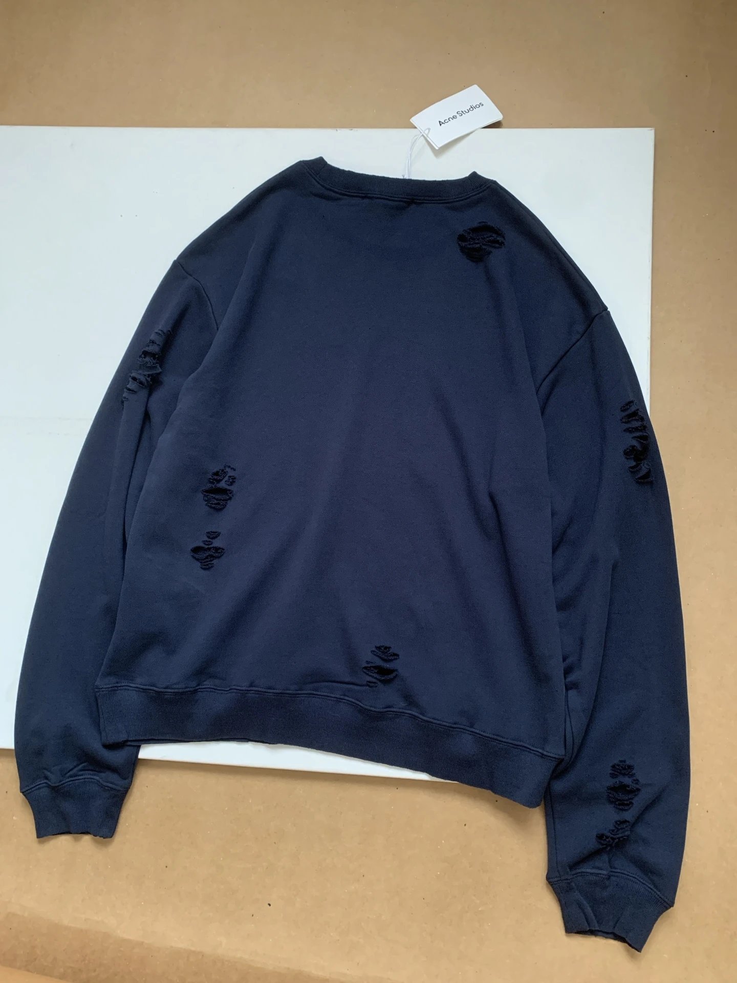 Ripped Crew Sweatshirt