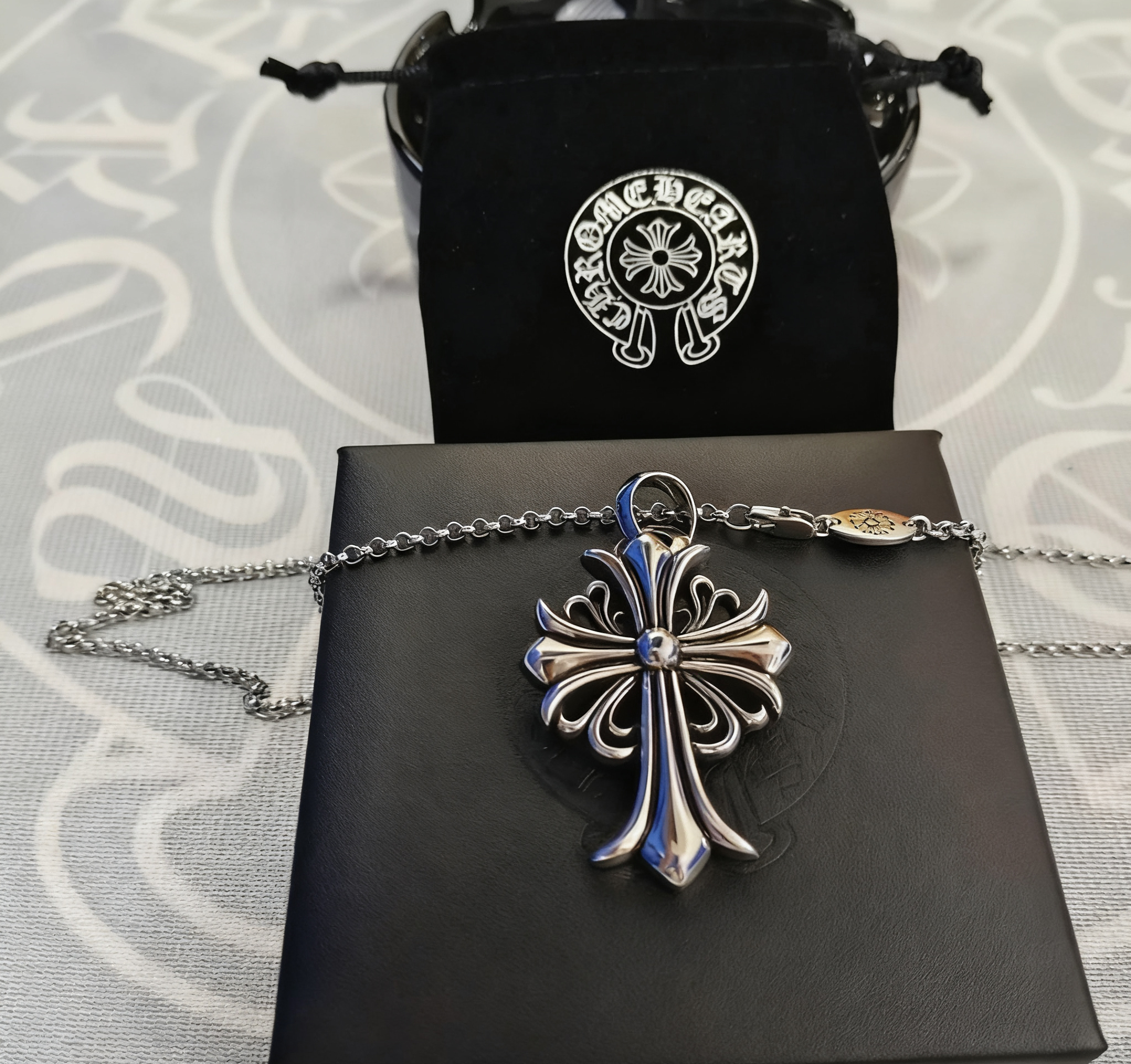 Cross pendant with a pearl necklace SKU image