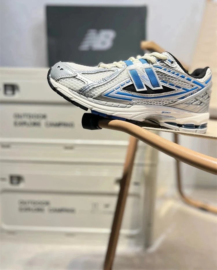 New Balance White and Blue Running Sneakers