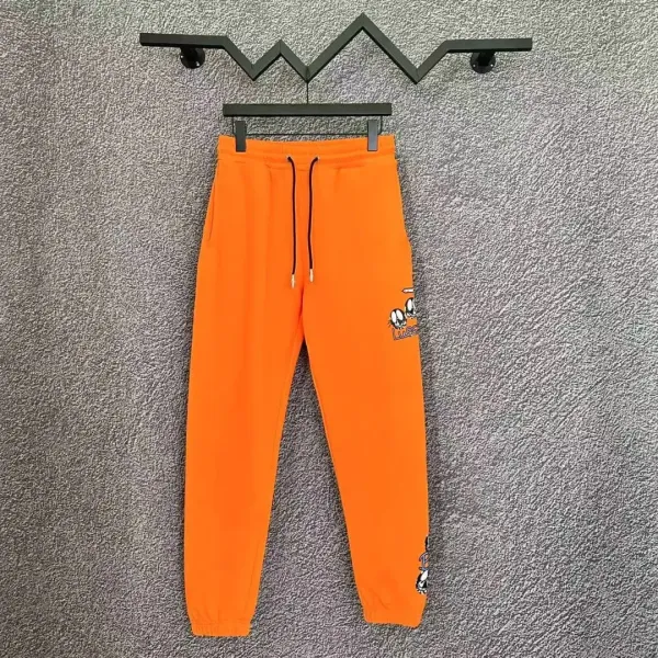 Design Orange Cartoon-Print Sweatpants - 1