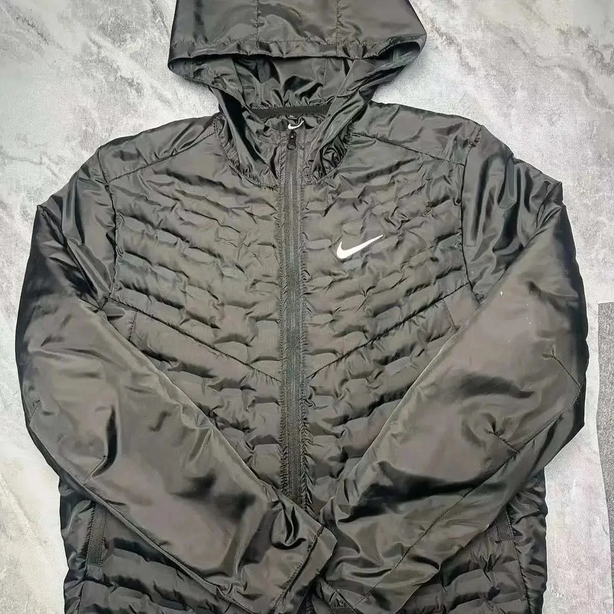 Long sleeved spliced down jacket